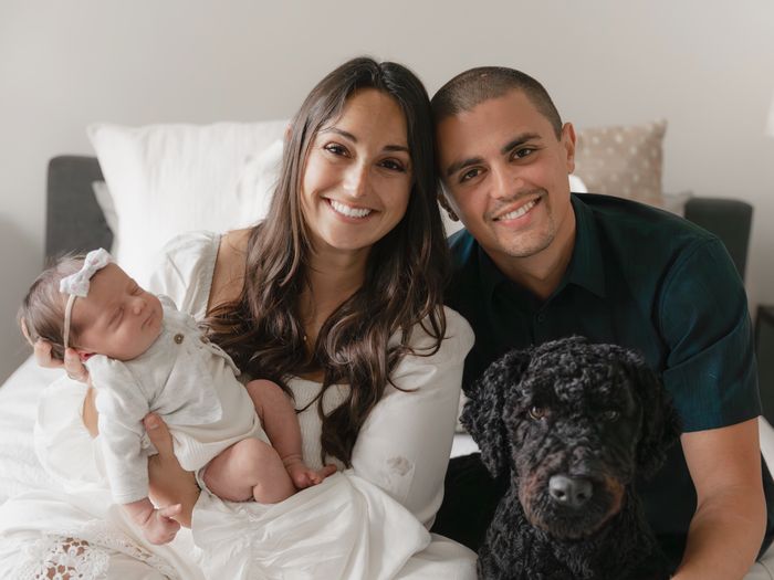 Kenneth Leivan, CPA, with his wife, daughter, and dog